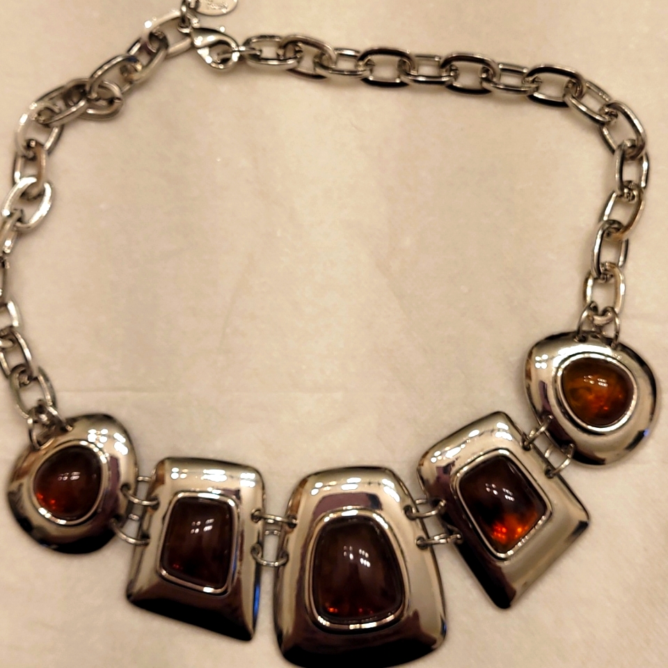 Kiam Family Silver Tone Choker Type Necklace With Amber Like Stone.